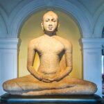 the-seated-buddha-in-meditation-pose-at-the-entrace-of-sri-lankas-national-museum-in-colombo1-150×150-1