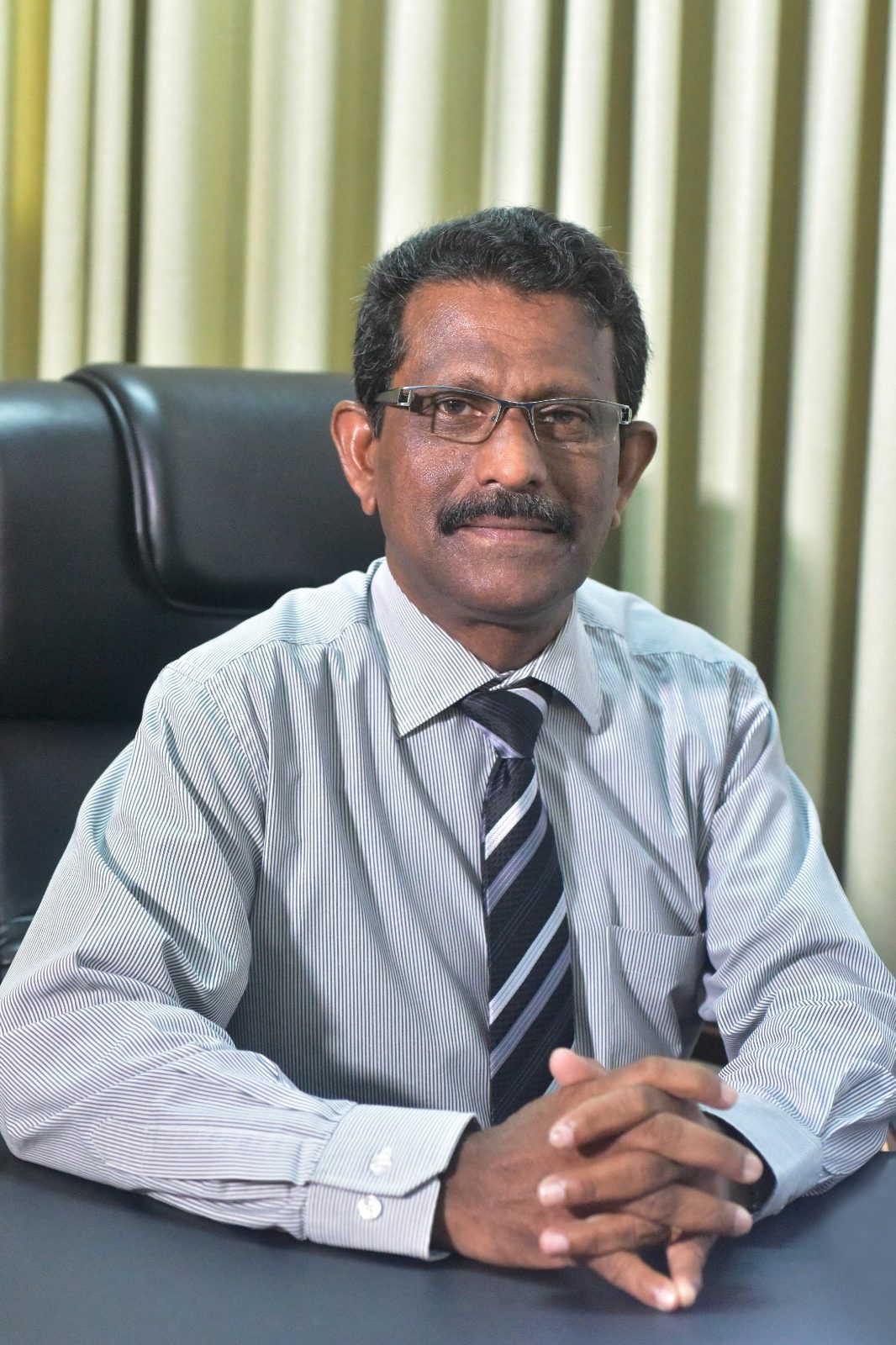 Dr. Nilan Cooray
